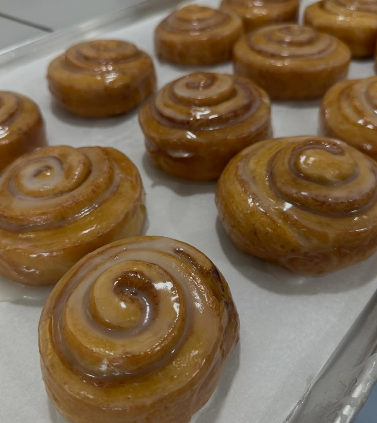 Fresh cinnamon rolls being made at DailyO